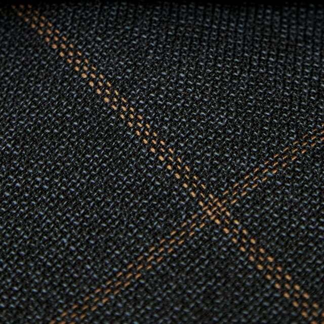Charcoal worsted with a thin rust overcheck.
